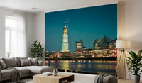 Sky-to-river gradient holds a lounge in mid-evening mood beneath this Skyline wall mural