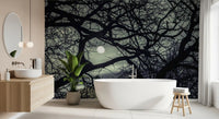 Gothic mood ties this Lunar Silhouette Midnight Branches wall mural together evenly.