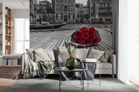 Cinematic contrast tightens the Red Roses, Grey Venice wall mural around one bloom.