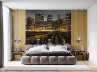 Evening architecture dominates the bedroom via a dark Golden wall mural