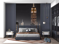 Viewing the dark skyline wall mural reveals dense blocks of tall modern NYC structures.