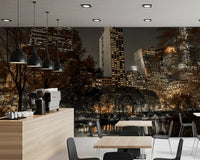 Lit window panels glow over a Café inside the Urban Oasis Nights wall mural setup