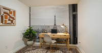 Monochrome rooftops sweep over a Study room with this Parisian Window View wall mural shot.