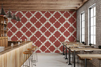 Linen-grain texture sits under the rust ground of the Lattice Trellis wallpaper field.