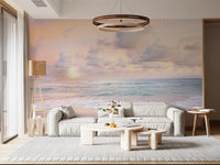 Coastal sunrise lights the Living room behind a Peach Sky Teal Sea wall mural