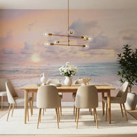 Turquoise water rolls toward warm sand in the Peach Sky Teal Sea wall mural