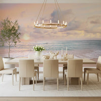 Behind the Dining room sits a Peach Sky Teal Sea wall mural with pale sky and quiet waves