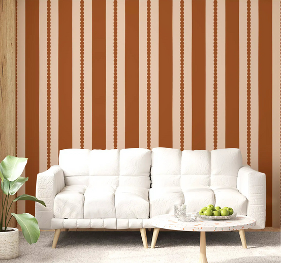 Warm Earth Stripes & Scallops Wallpaper featured inside a bright living room.