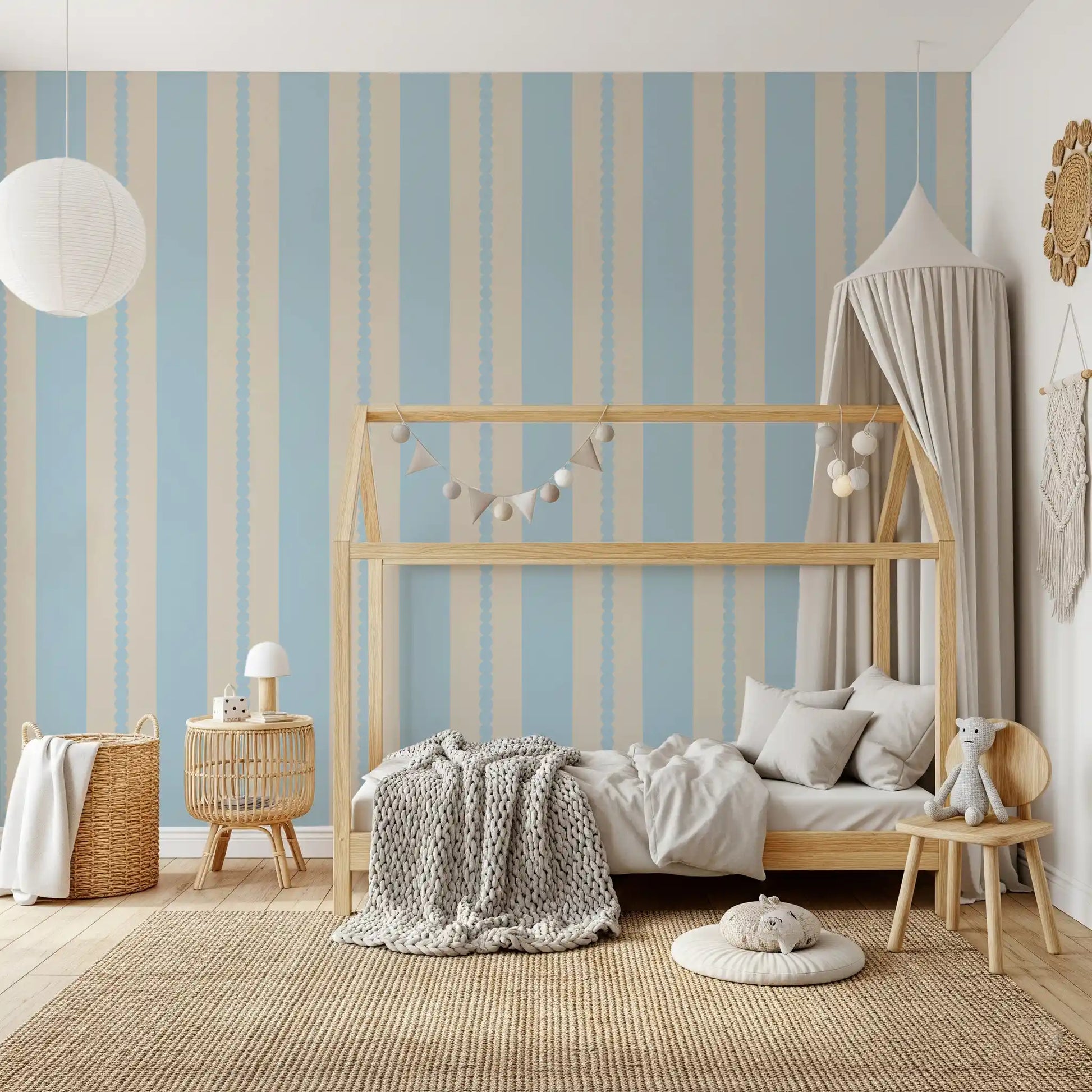Playful nursery featuring the Scalloped Serenity Stripes Wallpaper.