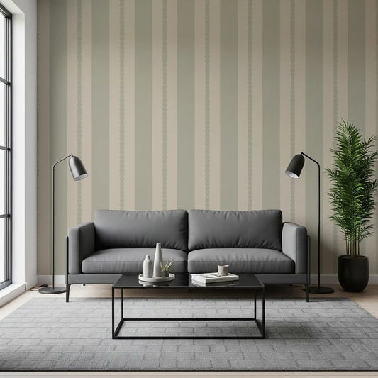 Living room fitted with Muted Scallop & Dot Stripes Wallpaper behind a dark sofa
