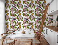 In Birds and Blossoms wallpaper, an orange-breasted robin perches among bloom-laden branches.