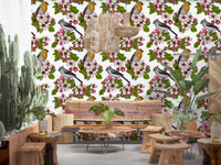 Greeting visitors at the Dinng room, Birds and Blossoms wallpaper opens with pink blooms.