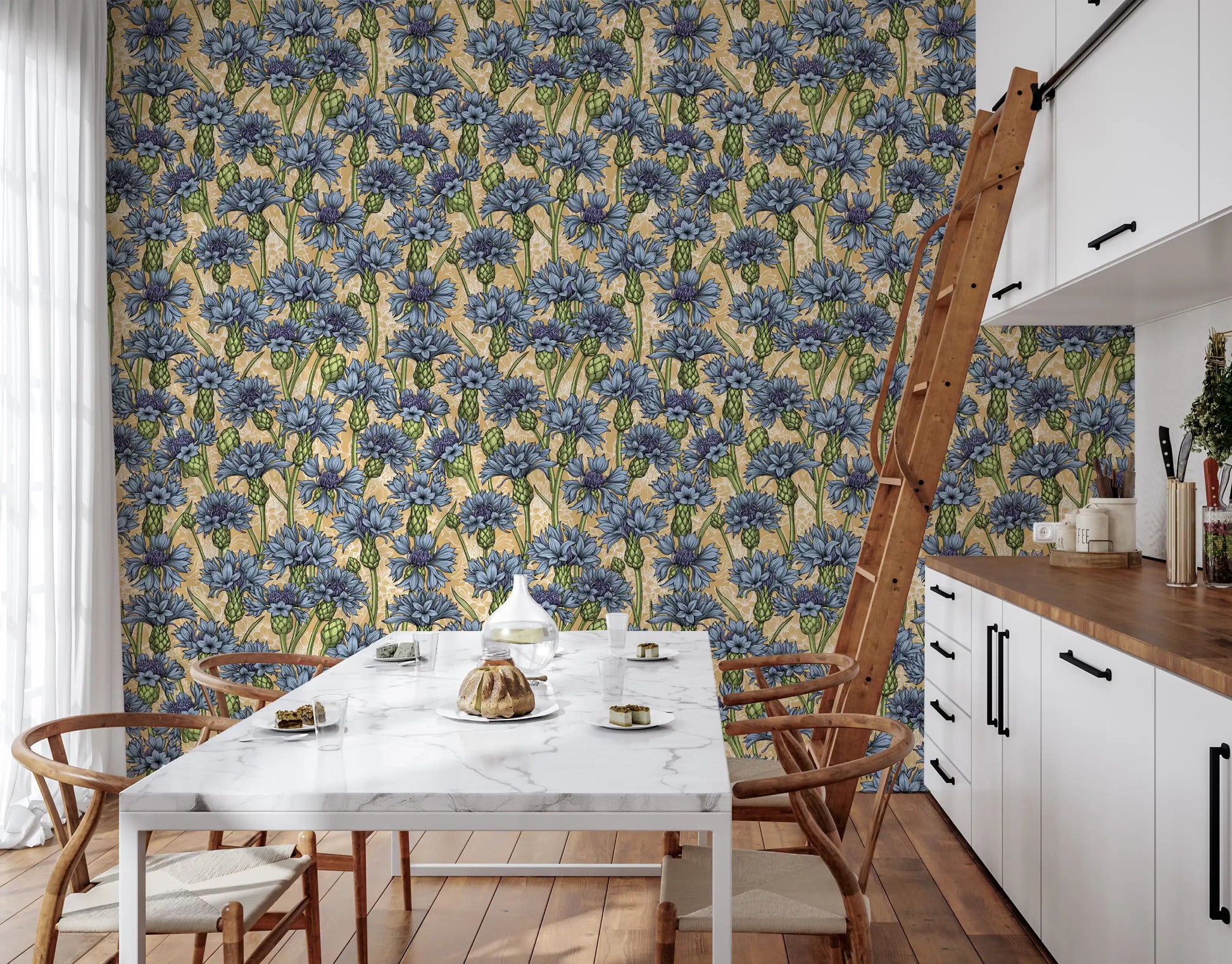 Blue cornflowers decorate our custom wallpaper inside this bright kitchen dining area.