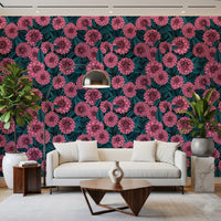 Deep teal greenery surrounds vibrant magenta flowers within the garden wallpaper.