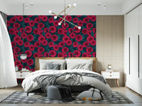 Giant red dahlias bloom across the custom wallpaper completing this calm bedroom.