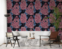 Pink lilac flowers decorate our custom wallpaper inside this bright Living room.