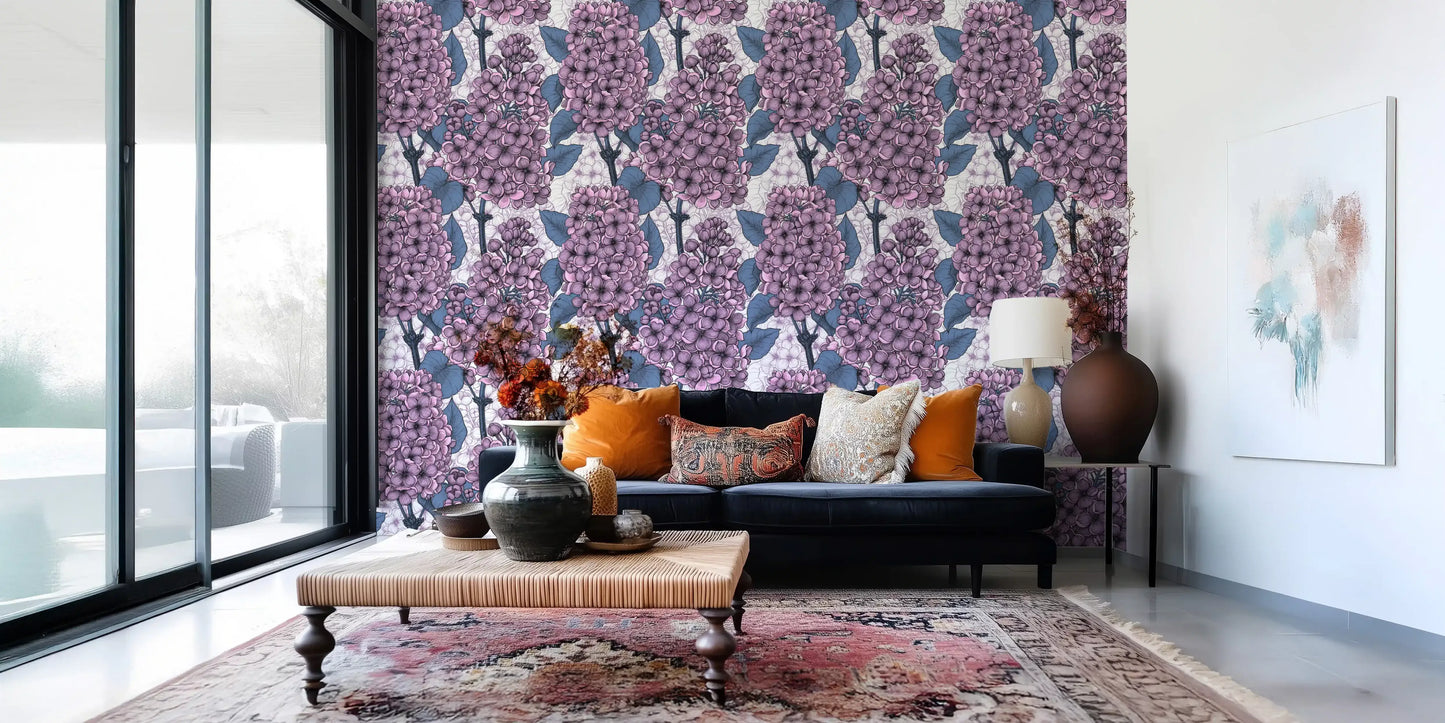 Detailed botanical drawings make up the intricate design of the lilac wallpaper.