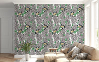 Vibrant green leaves create depth on this nature-inspired botanical wallpaper.