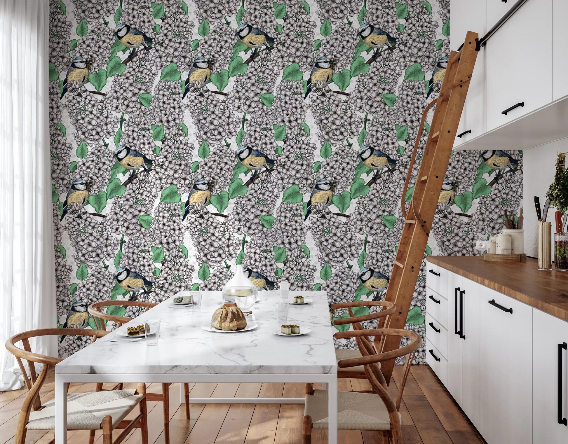 This Birds in the lilac tree, white and green Wallpaper fills the Kitchen and dining room area .