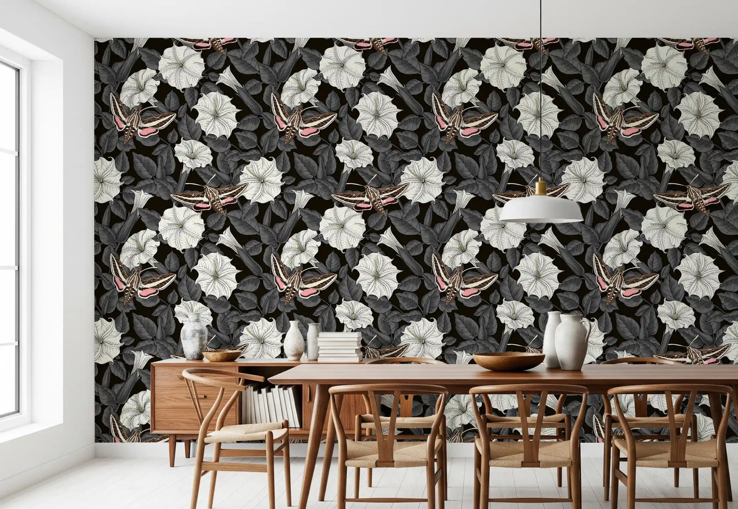 Dark foliage grounds the white blossoms in the Moonflowers and sphinx moths wallpaper.