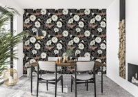 The striking Moonflowers and sphinx moths wallpaper anchors this sunlit Dining room.