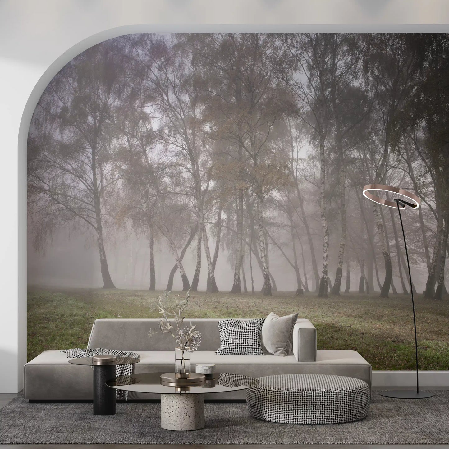 Misty Birch Grove scenery formatted as a wall mural surrounds the dark Lounge area .