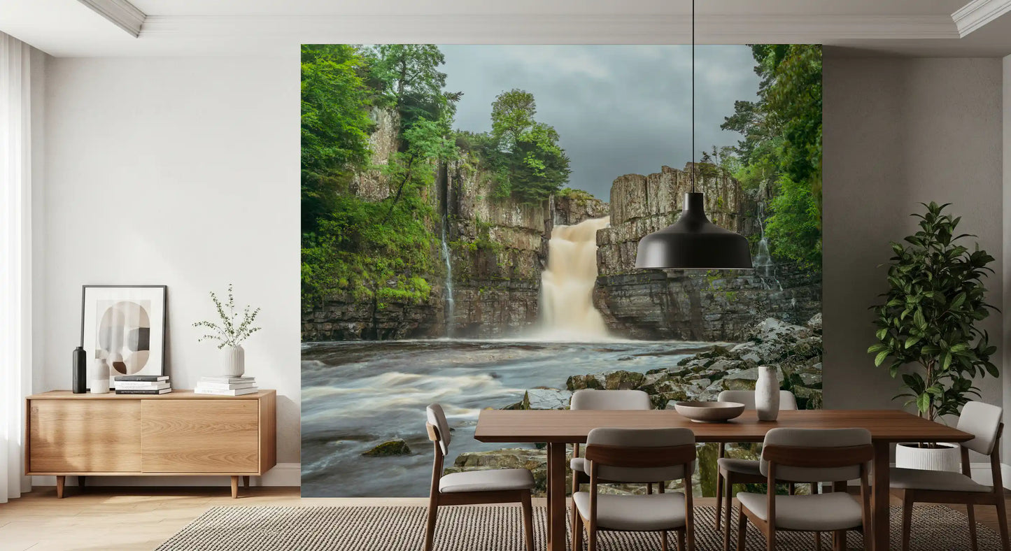 Natural earthen tones of an Emerald wall mural warm up an open dining area.