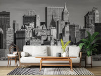 Living room spaces host a Manhattan Monochrome Majesty wall mural.