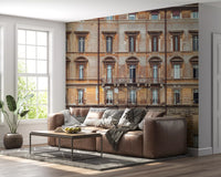 Faded terracotta and brown stucco span this European Facade wall mural.