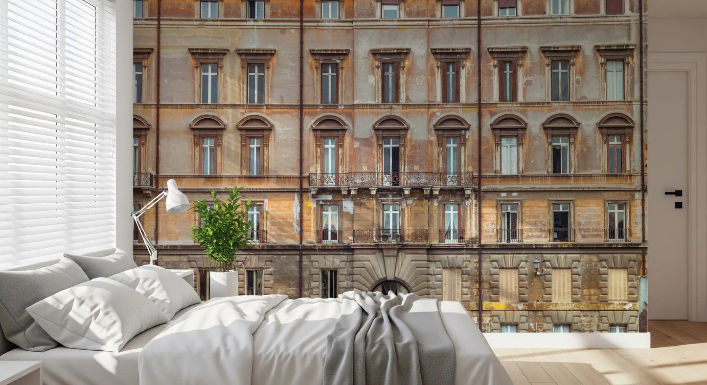Behind the Bedroom sits a European Grandeur Facade wall mural with palazzo depth.