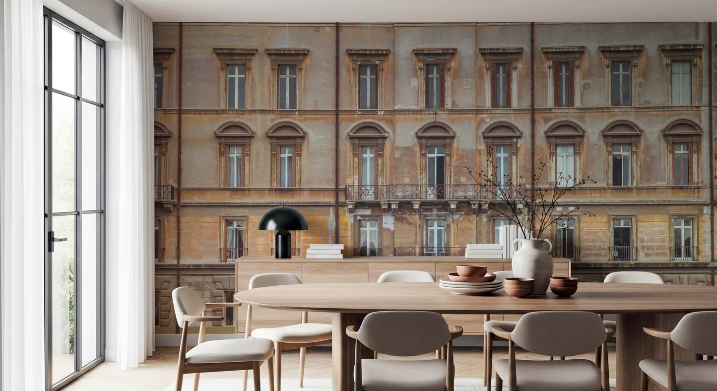 Sepia palazzo tones spread behind the dining room via a Grandeur Facade wall mural.
