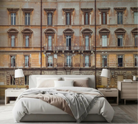 European Grandeur Facade wall mural gives the bedroom an old-city palazzo backdrop.