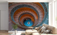 Hallway depth grows under Bramante's Infinite Ascent wall mural and its spiral pull.