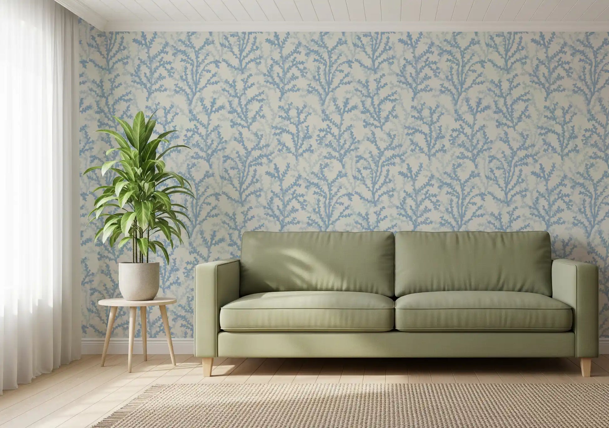 Indigo tones move through Painted Coraline Dreaming Blue wallpaper inside a calm lounge.