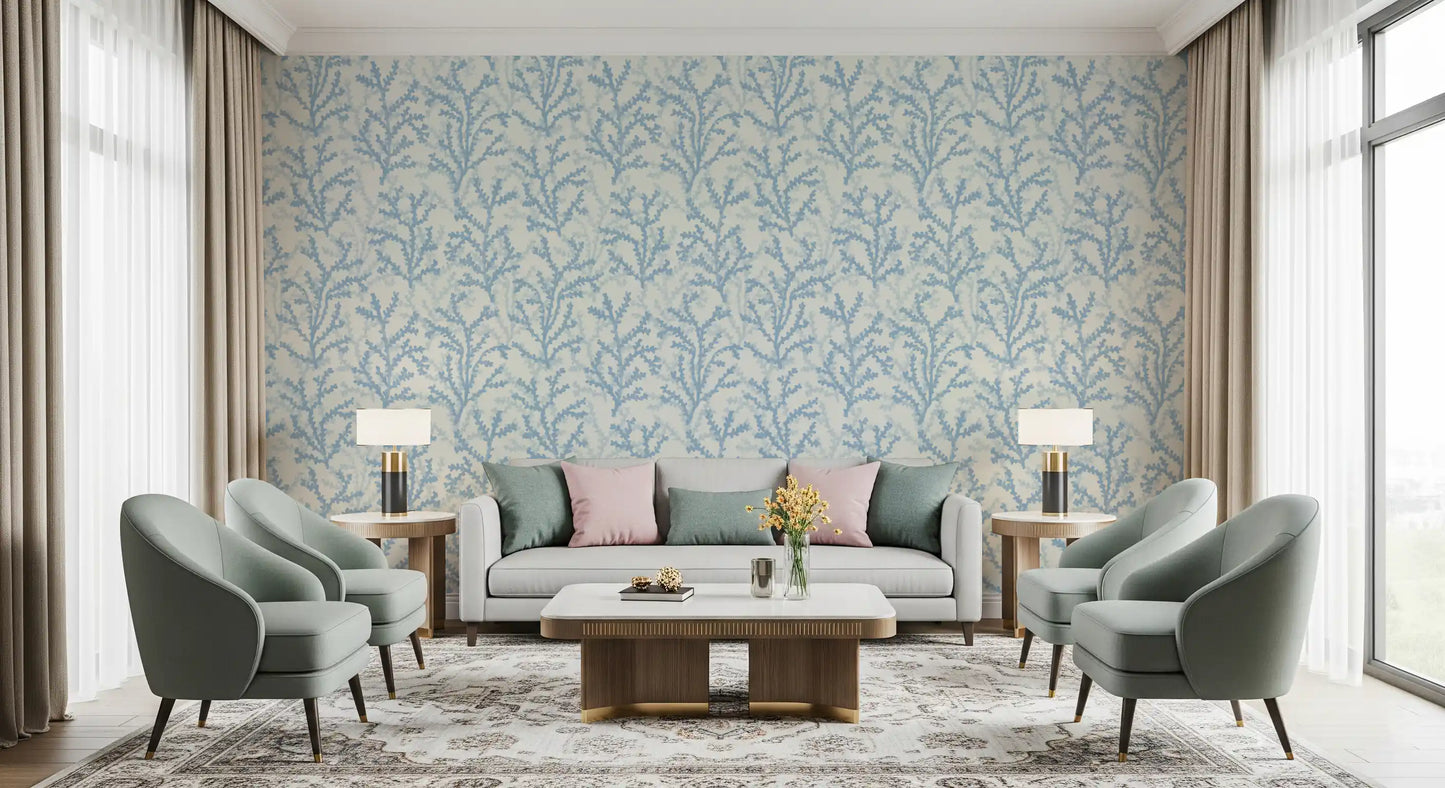 Repeating coral motif on ivory gives Painted Coraline Dreaming Blue wallpaper its rhythm.