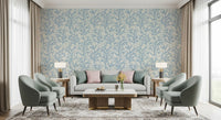 Repeating coral motif on ivory gives Painted Coraline Dreaming Blue wallpaper its rhythm.