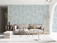 Watery branches in Painted Coraline Dreaming Blue wallpaper freshen a Living room .