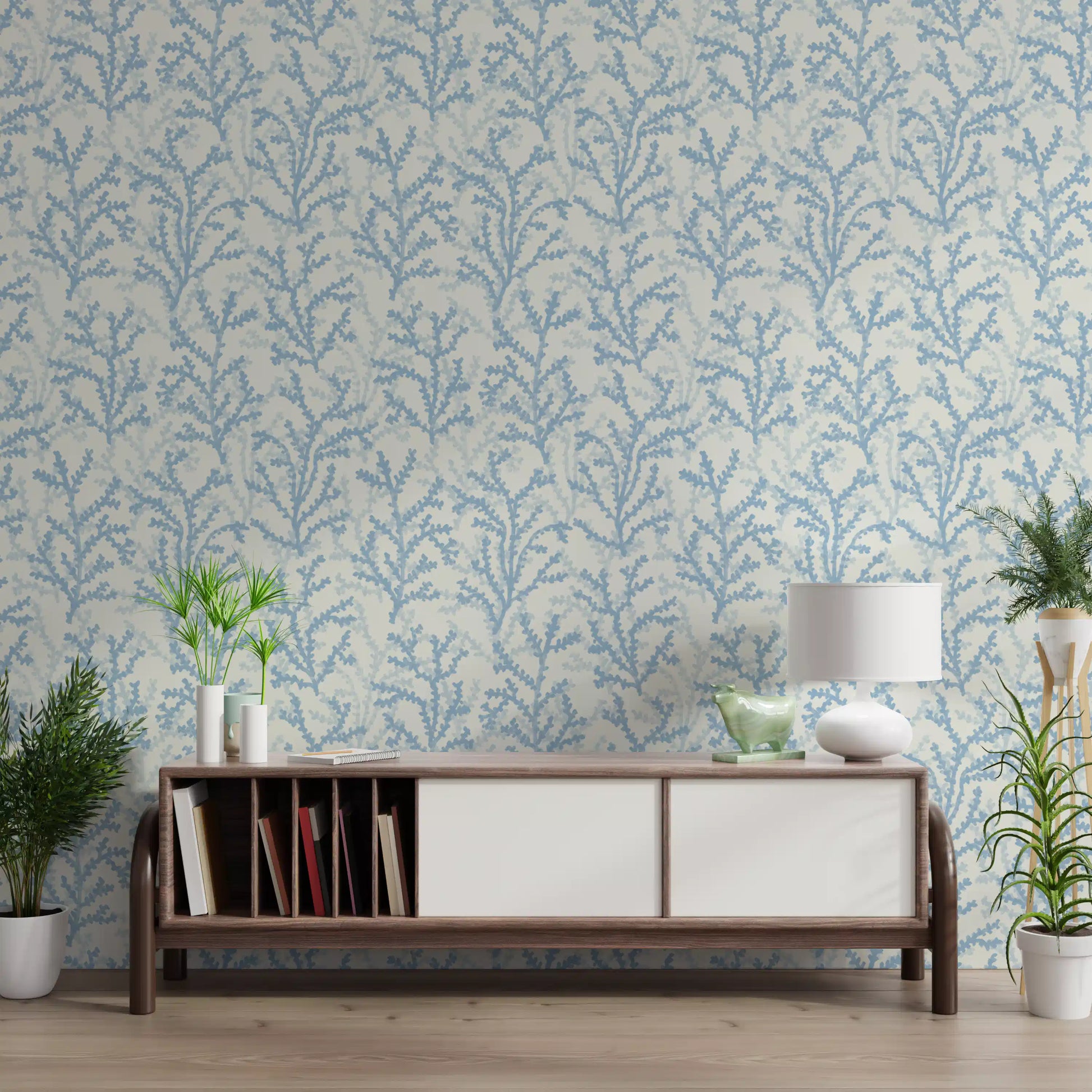 Pale blue brushstrokes of Painted Coraline Blue wallpaper line a clean hallway.
