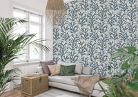 A long line of sprigs in the Coraline Teal wallpaper guides a Living room