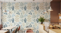 Patrons enjoy coffee near the Painted Corals Wallpaper installed in a modern cafe space.