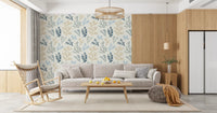 Navy and beige reef adorn this Living room wallpaper setting behind a grey bed.