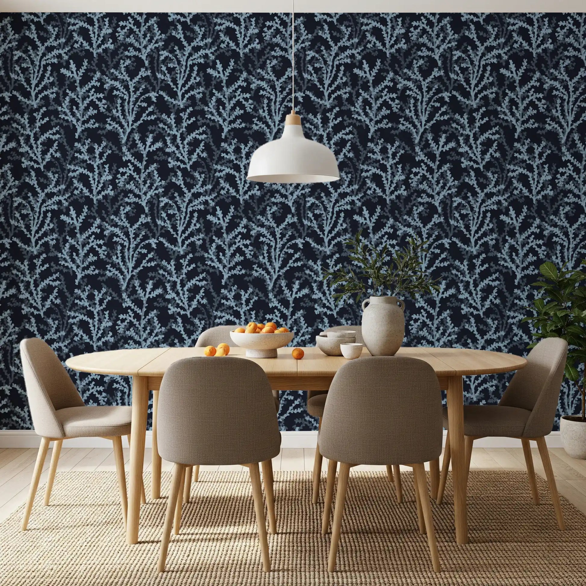 Neutral textiles complement the rich Blue wallpaper throughout the Dining room area 
