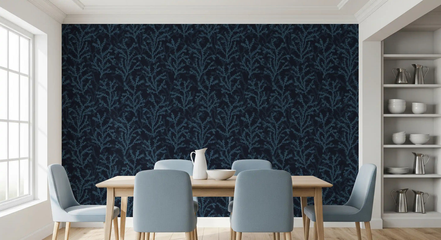 A Dining space balances white cribs with dark oceanic wallpaper backdrops.
