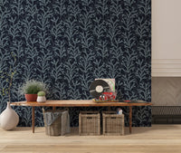 Pale seaweed stems overlap on this Painted Coraline Slate Gray Dark wallpaper.