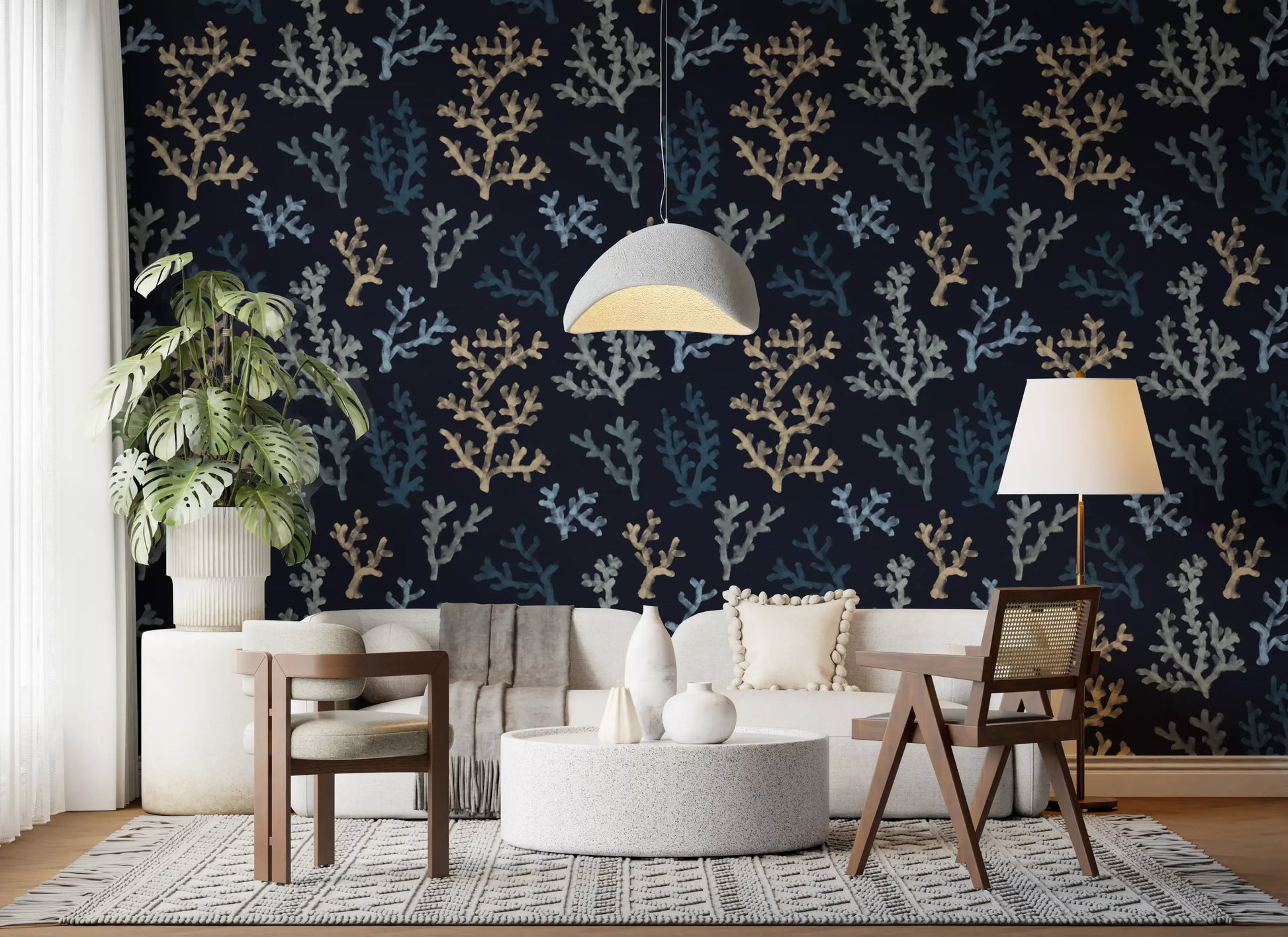 Warm lighting oceanic patterns in a Living room using Painted Corals Dark Wallpaper.