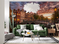 Glowing window lights reflect perfectly on the water within this Amsterdam wall mural.
