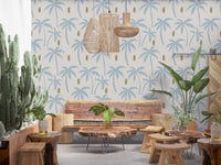 palm tree in pale blue printed on warm ivory wallpaper with olive brushstroke 