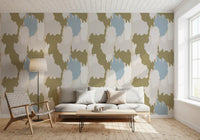 Boho coastal wallpaper with layered olive shapes and airy neutral contrast