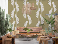 Cafe area wall featuring Banana Leaf Wallpaper with muted olive green style
