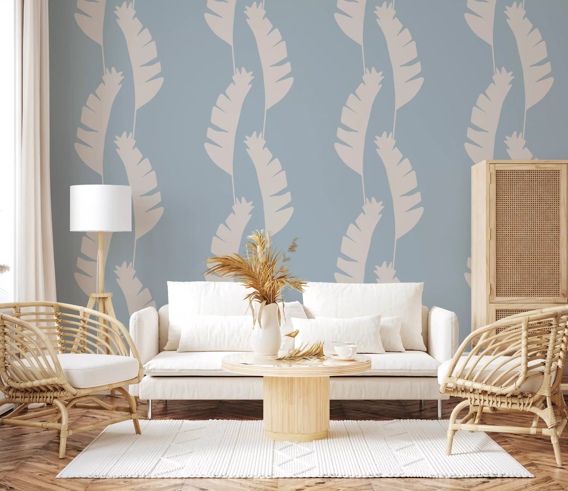 Living room wall using Boho Coastal Wallpaper with pale blue leaf silhouettes